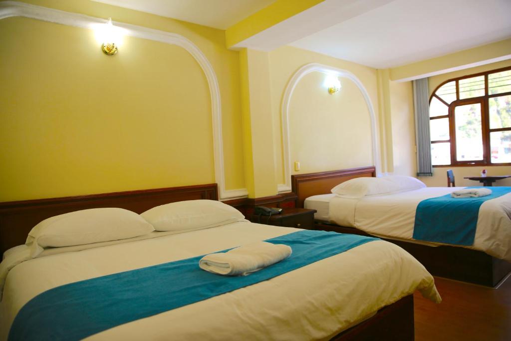 Postel nebo postele na pokoji v ubytování Hotel Donde Marcelo