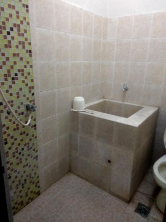 Koupelna v ubytování Sartika Hotel Prawirotaman