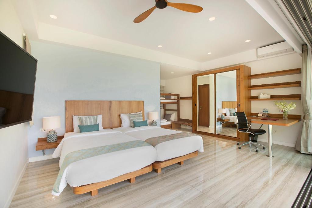 Postel nebo postele na pokoji v ubytování Villa SeaNest Samui