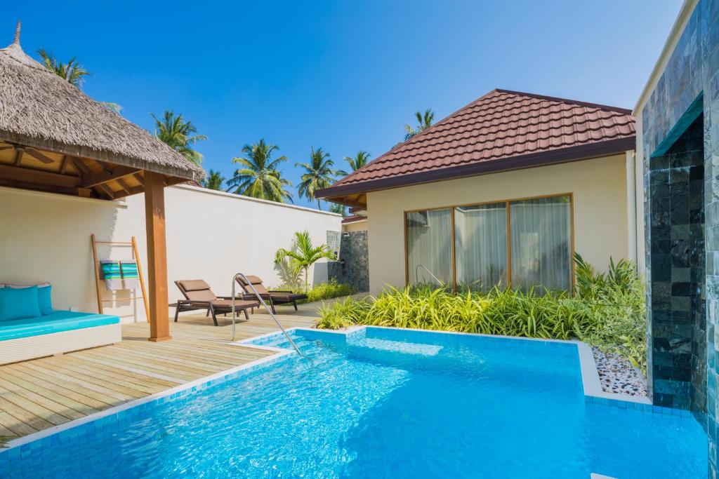 Bazén v ubytování Kurumba Maldives nebo v jeho okolí