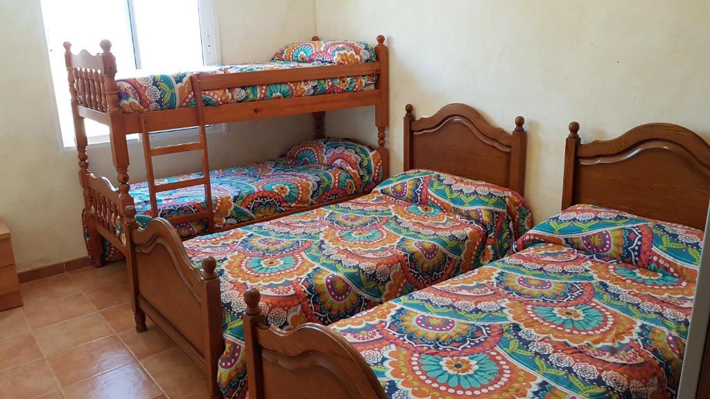 Postel nebo postele na pokoji v ubytování Rural Romana
