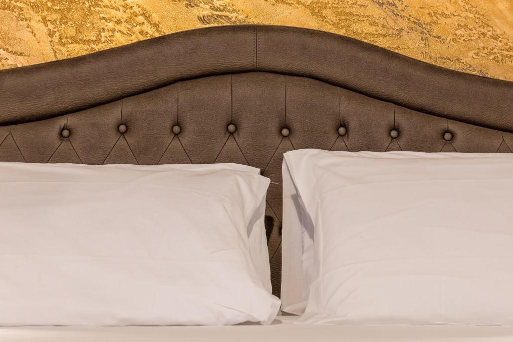 Uma cama ou camas num quarto em StarHome Navona