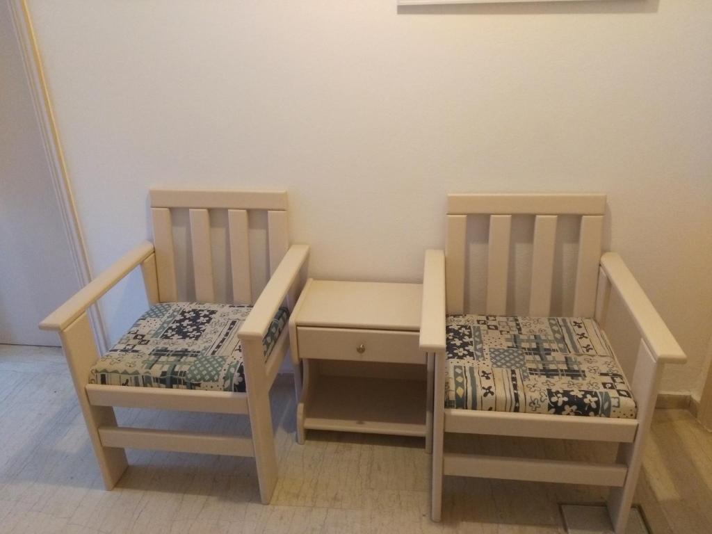 Una cama o camas en una habitación de Studios Iris