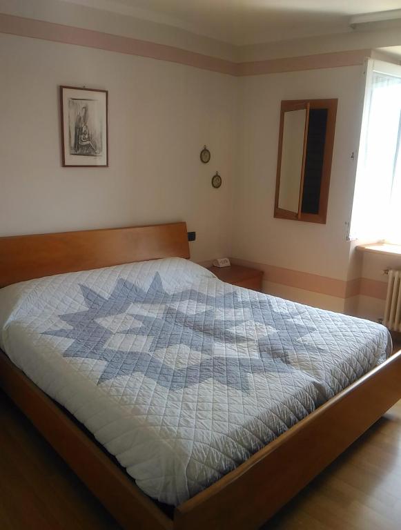 Casa del Borgo tesisinde bir odada yatak veya yataklar