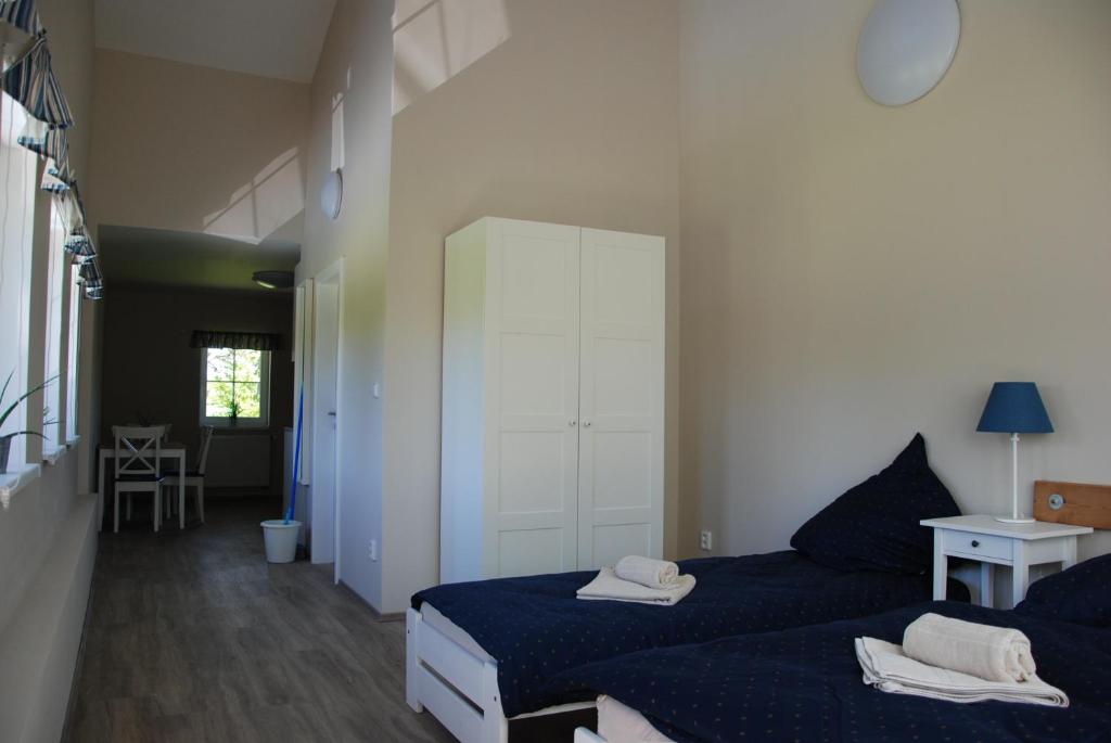 Postel nebo postele na pokoji v ubytování Apartment Ptačí Dům