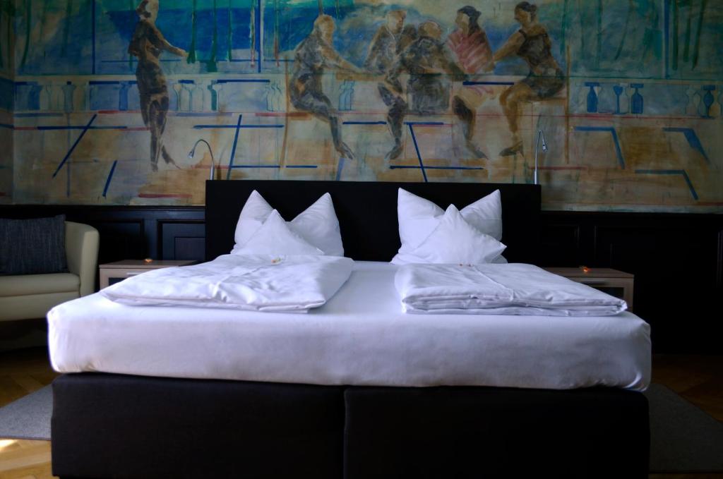 Postel nebo postele na pokoji v ubytování Hotel Astoria