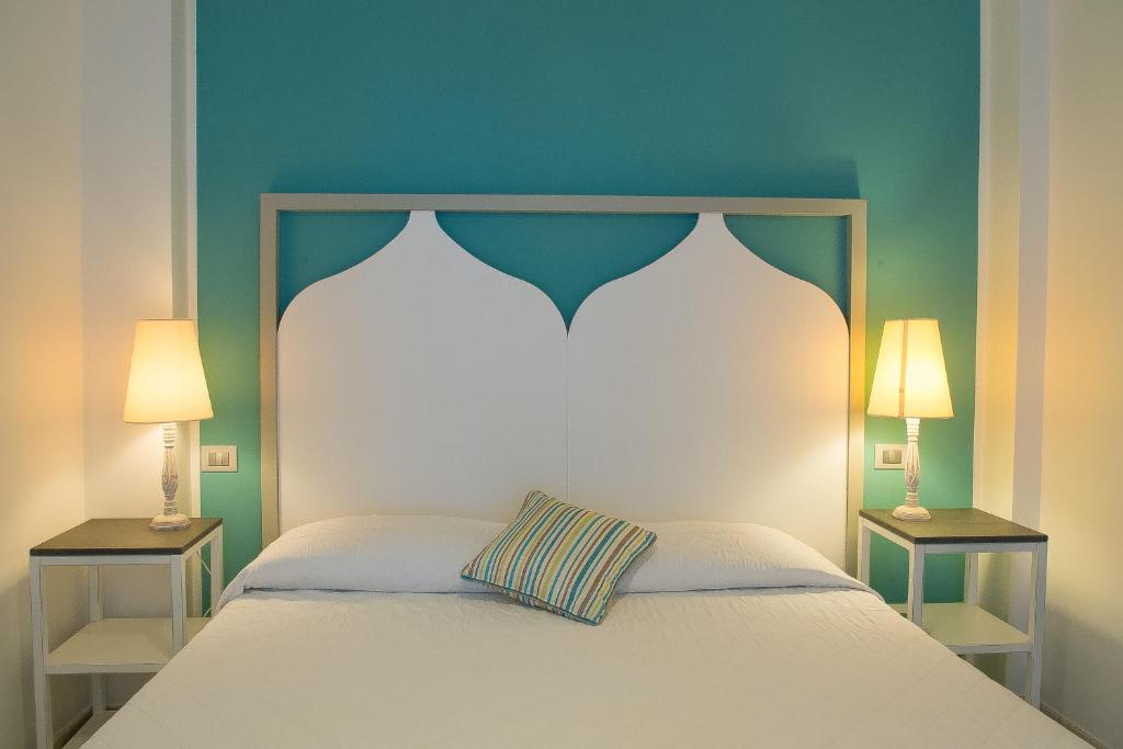 Postel nebo postele na pokoji v ubytování Hotel Cutimare - Aeolian Charme