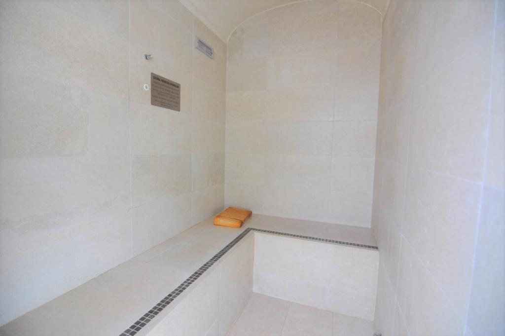 Koupelna v ubytování Hotel Montecarlo Spa & Wellness