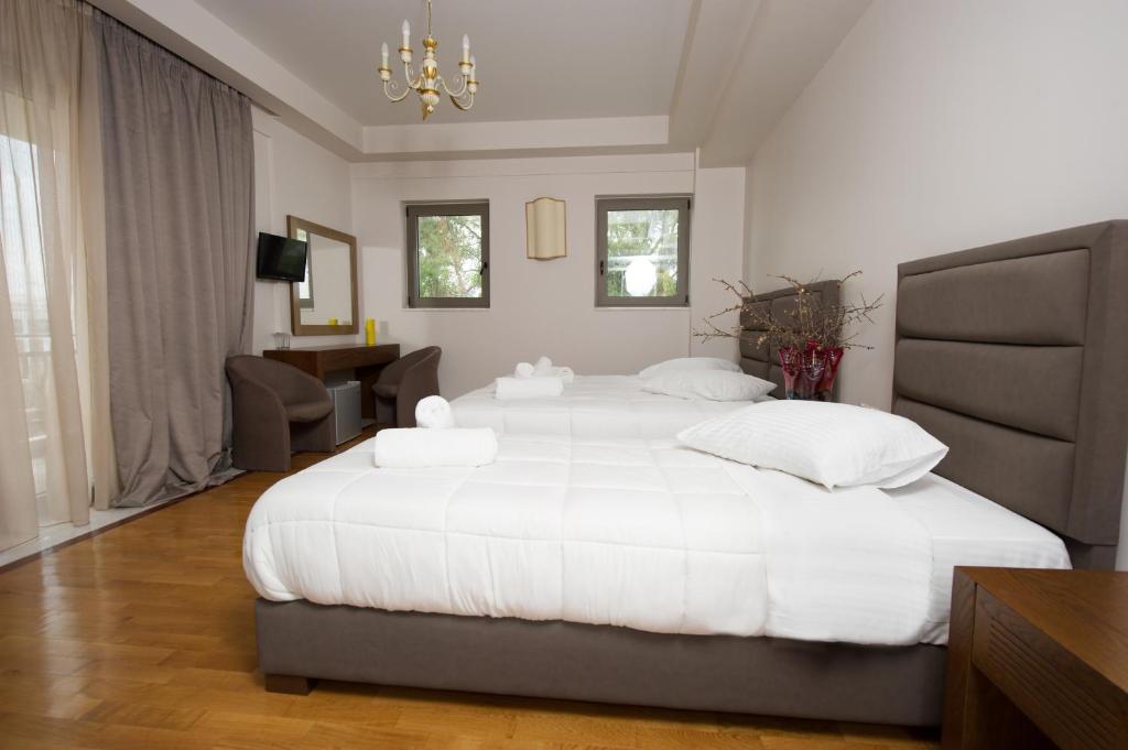 Posteľ alebo postele v izbe v ubytovaní Corali Resort