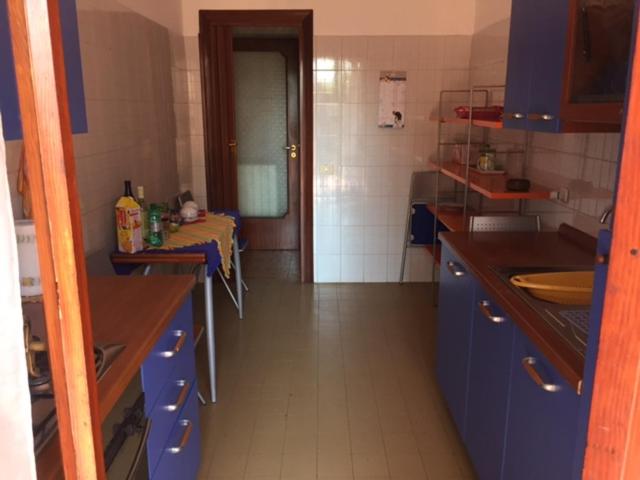 A kitchen or kitchenette at Roma Cinecittà Free WI-FI
