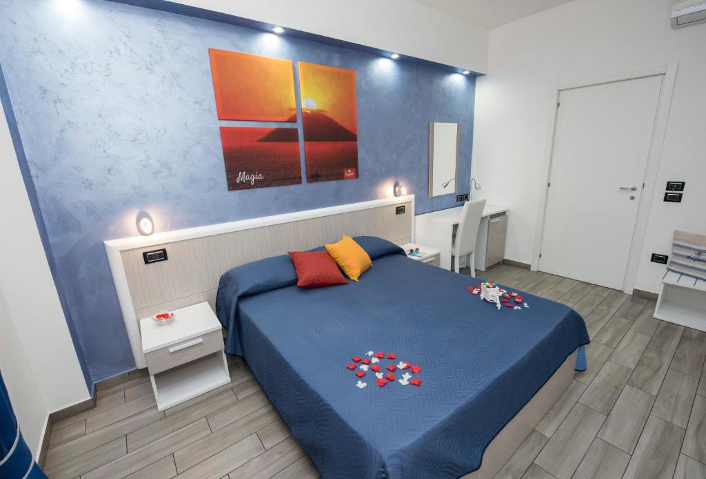 Postel nebo postele na pokoji v ubytování B&B Sunlight Tropea
