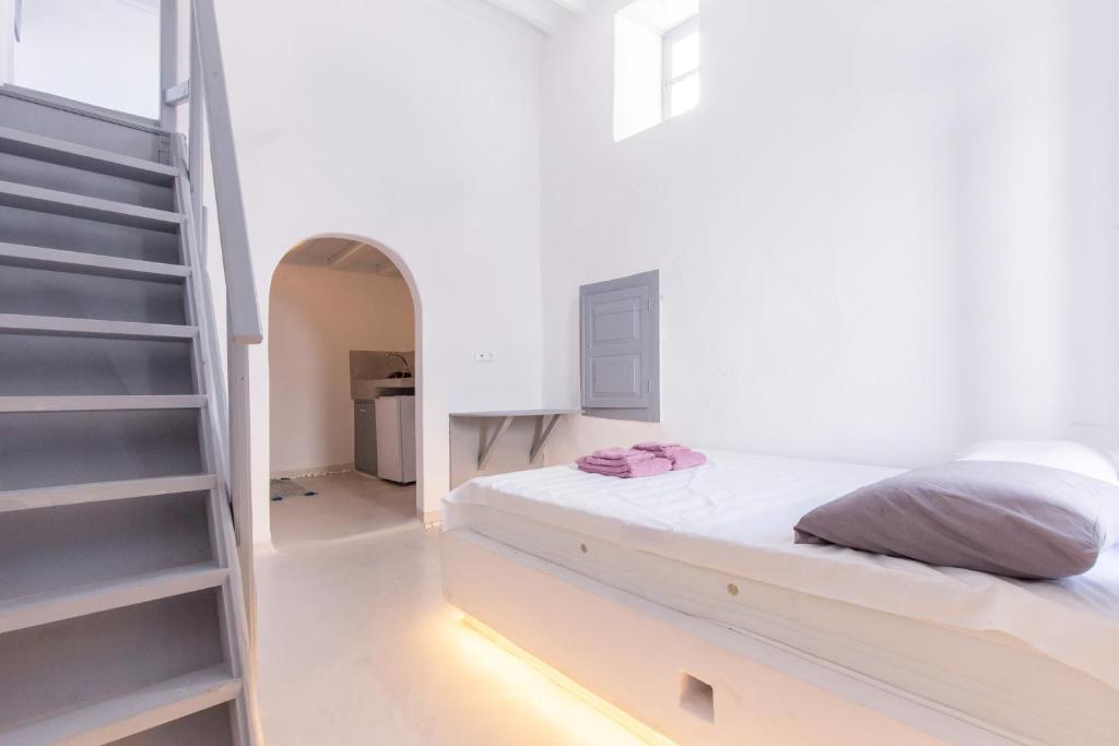 Posteľ alebo postele v izbe v ubytovaní Melina's House Mykonos Town
