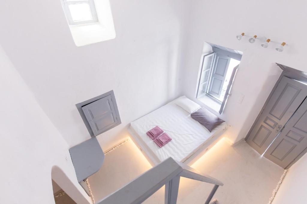Posteľ alebo postele v izbe v ubytovaní Melina's House Mykonos Town