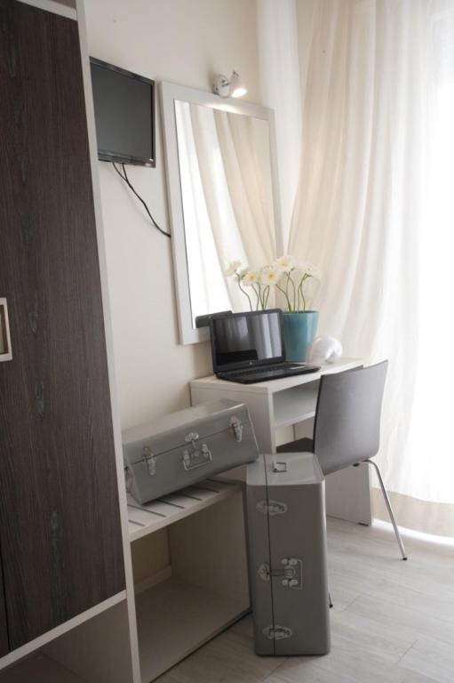 Kuchyň nebo kuchyňský kout v ubytování Hotel Tosi