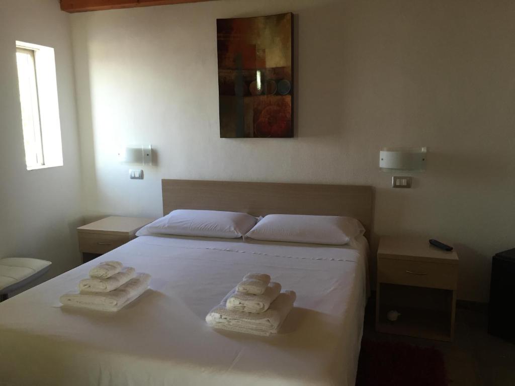 Postel nebo postele na pokoji v ubytování B&B Torrefano
