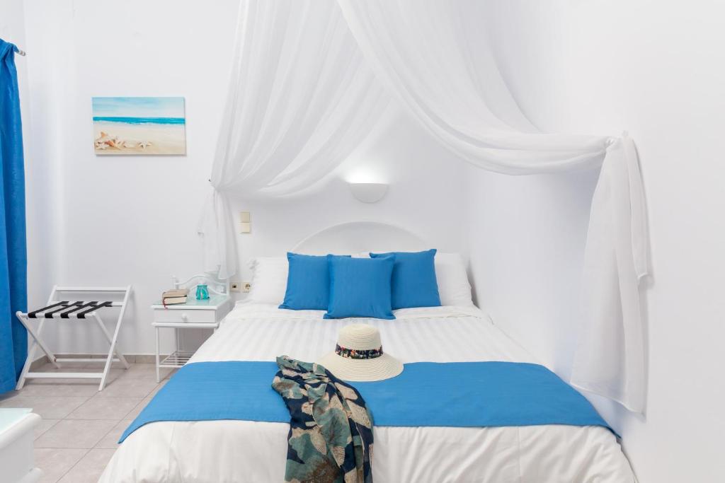 Postel nebo postele na pokoji v ubytování Margarita Hotel