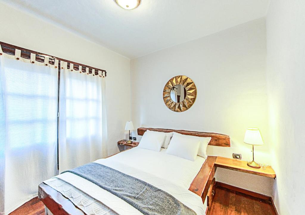 A bed or beds in a room at Apartamentos Rurales Islas Canarias