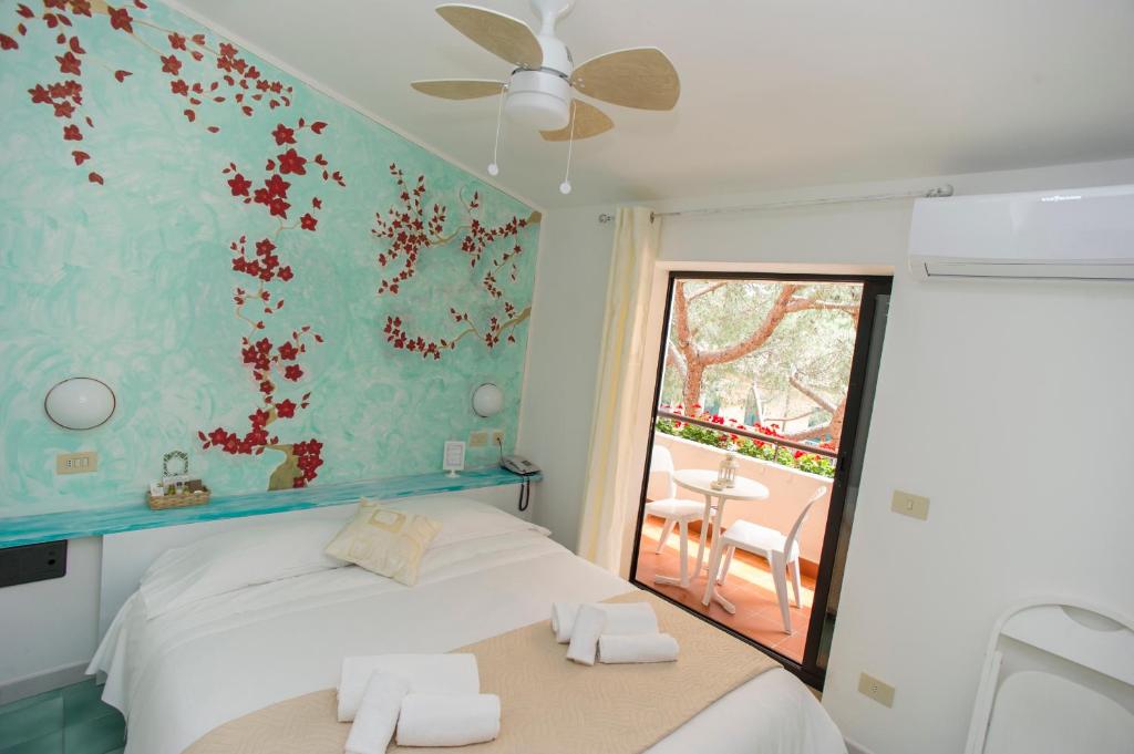 Hotel Punto Verdeにあるベッド