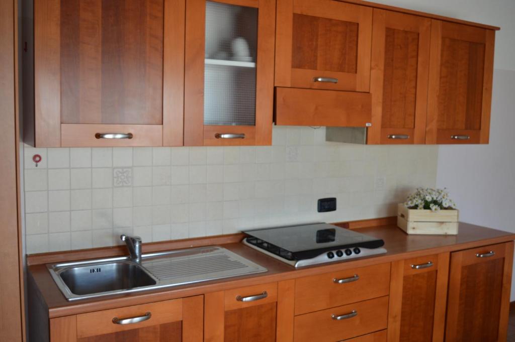 A kitchen or kitchenette at Residenza Villa Margherita