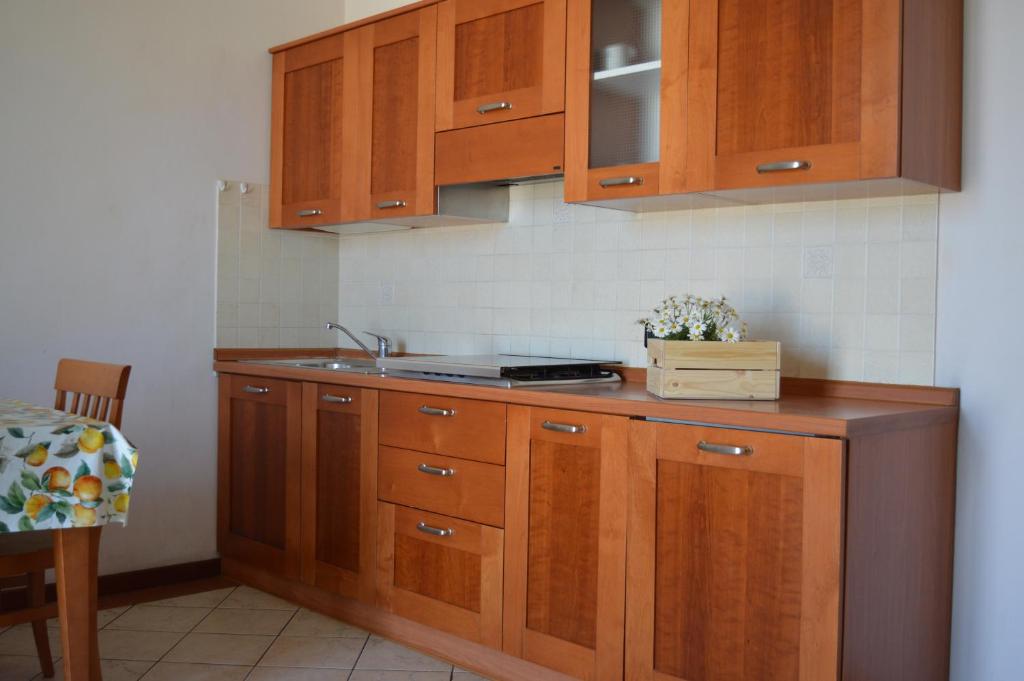 A kitchen or kitchenette at Residenza Villa Margherita