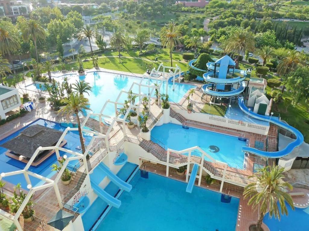 an aerial view of a pool at a resort at Benalbeach Costa in Benalmádena