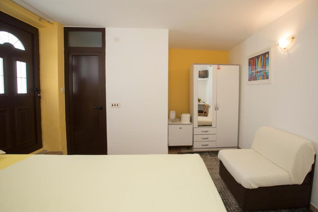 Postel nebo postele na pokoji v ubytování Room Dioklecijan