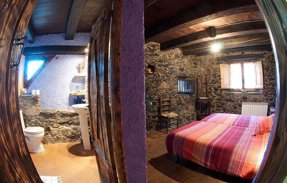 Postel nebo postele na pokoji v ubytování Casa Independiente Rural Ca de Corral