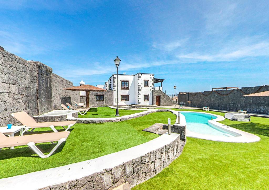 The swimming pool at or close to Apartamentos Rurales Islas Canarias