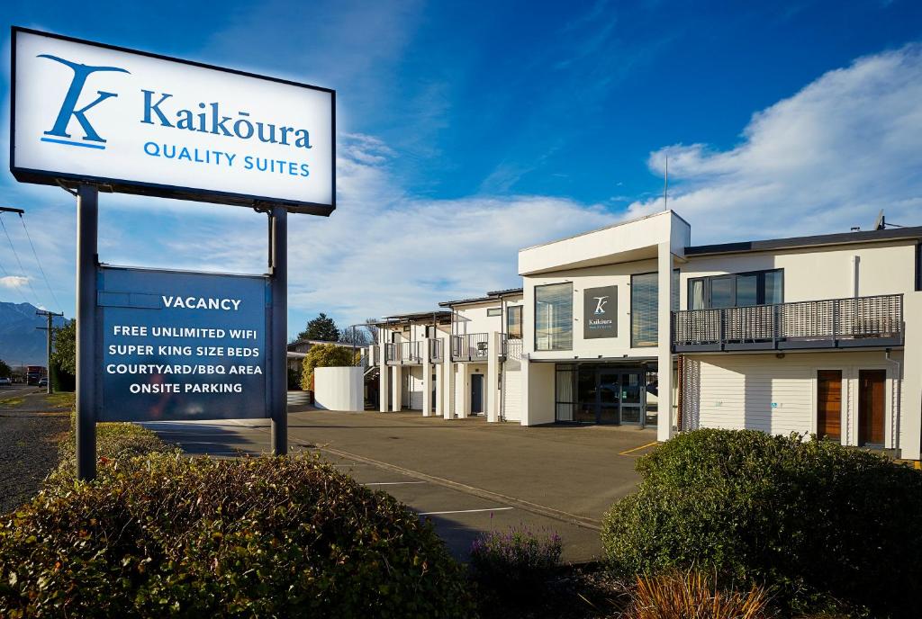 a sign in front of a row of buildings at Kaikoura Quality Suites in Kaikoura