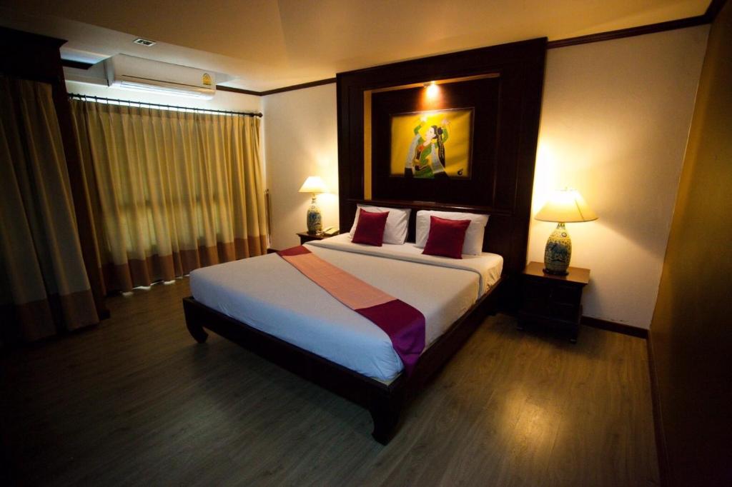 Postel nebo postele na pokoji v ubytování Chour Palace Hotel