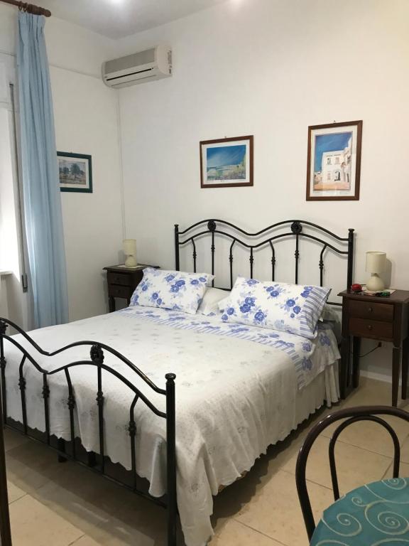 Postel nebo postele na pokoji v ubytování Albergo Europa