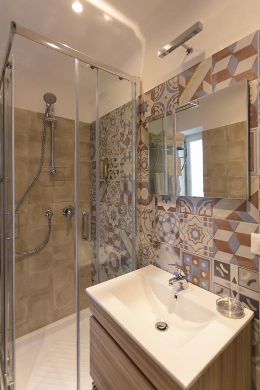 a bathroom with a sink and a shower at To Be Capri in Capri