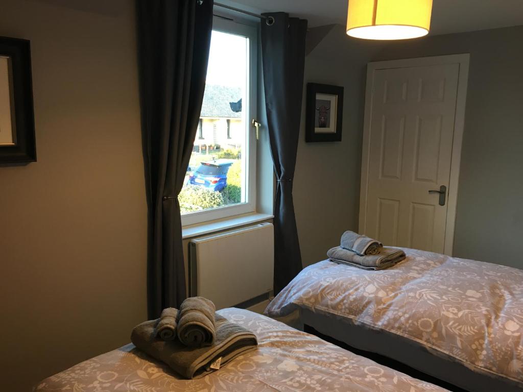 Postel nebo postele na pokoji v ubytování 25 Windsor Crescent