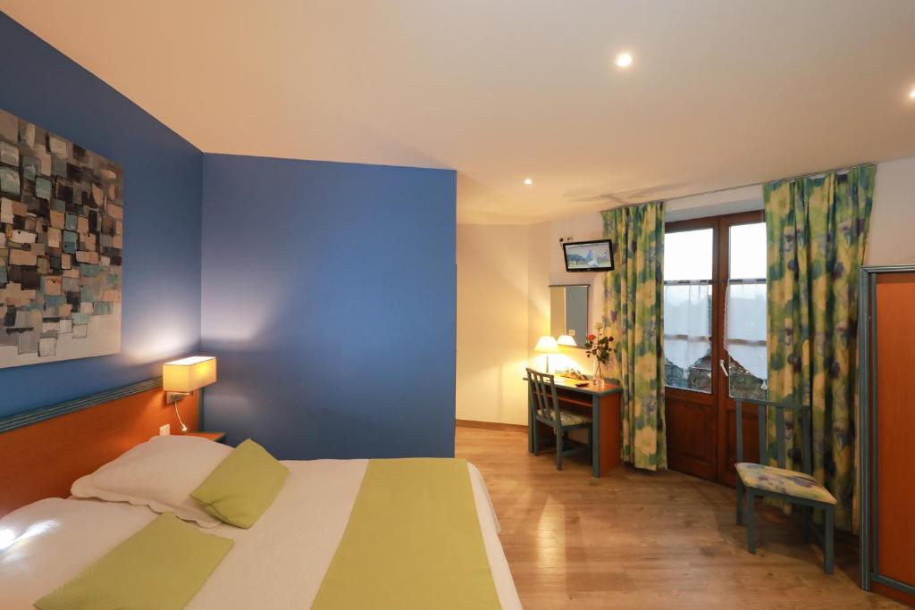 Postel nebo postele na pokoji v ubytování Hotel Restaurant 3 Châteaux
