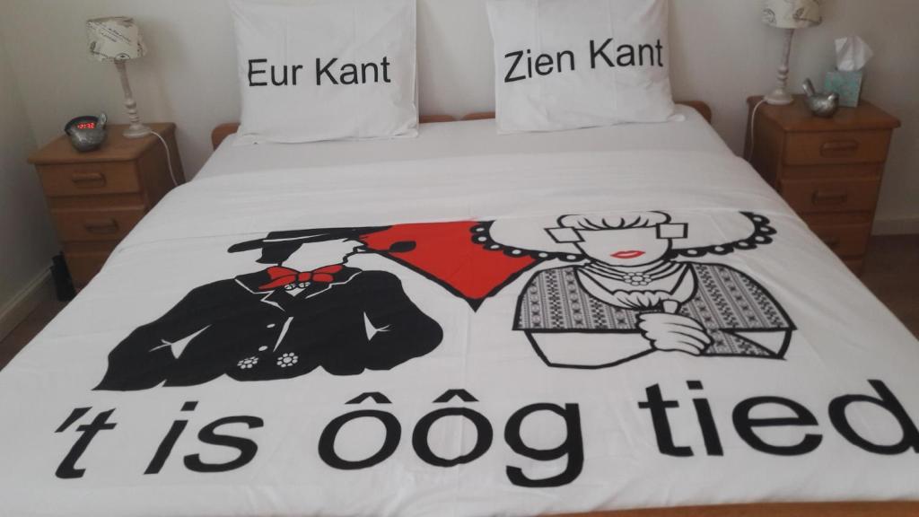 Säng eller sängar i ett rum på De Nieuwe Stal