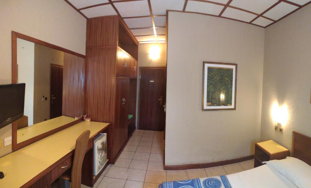 TV a/nebo společenská místnost v ubytování Manuela Residence