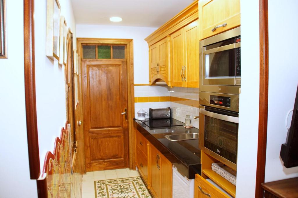 Kuchyňa alebo kuchynka v ubytovaní Sitges Royal Rooms