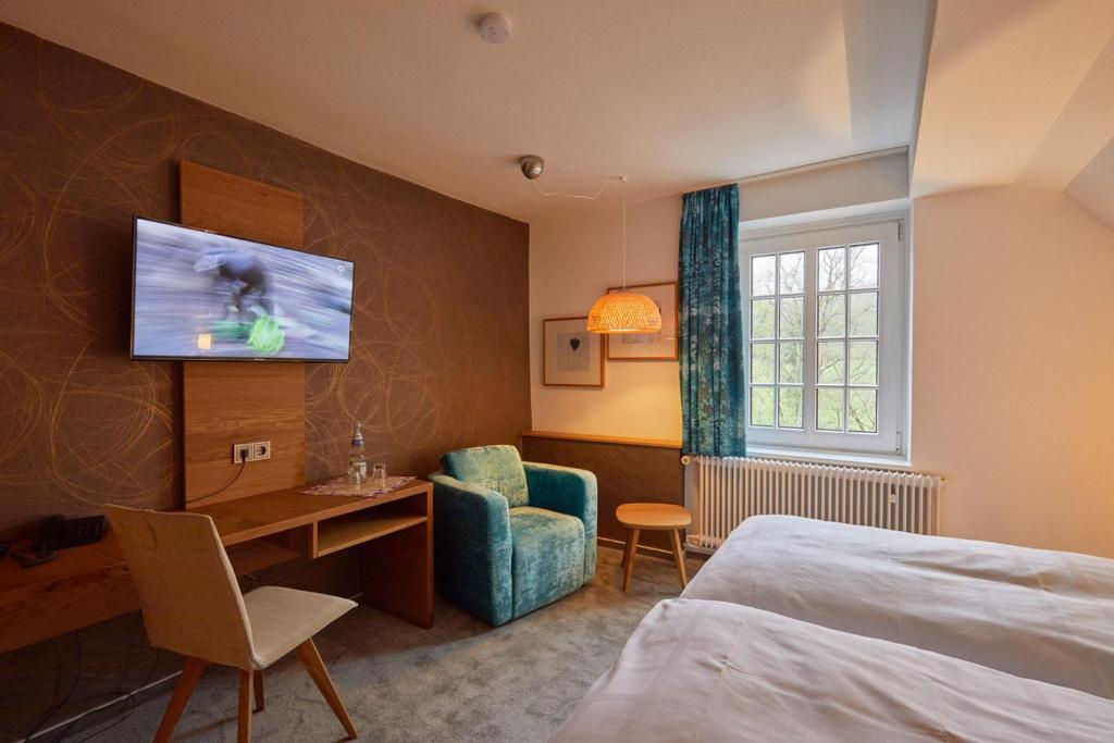 Postel nebo postele na pokoji v ubytování Hotel Haus Recke
