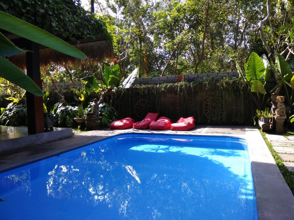 Bazén v ubytování Kencana Ubud by Mahaputra nebo v jeho okolí