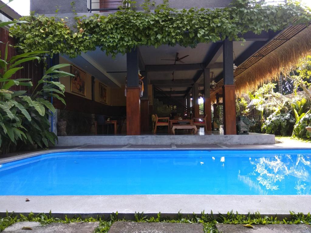 Bazén v ubytování Kencana Ubud by Mahaputra nebo v jeho okolí