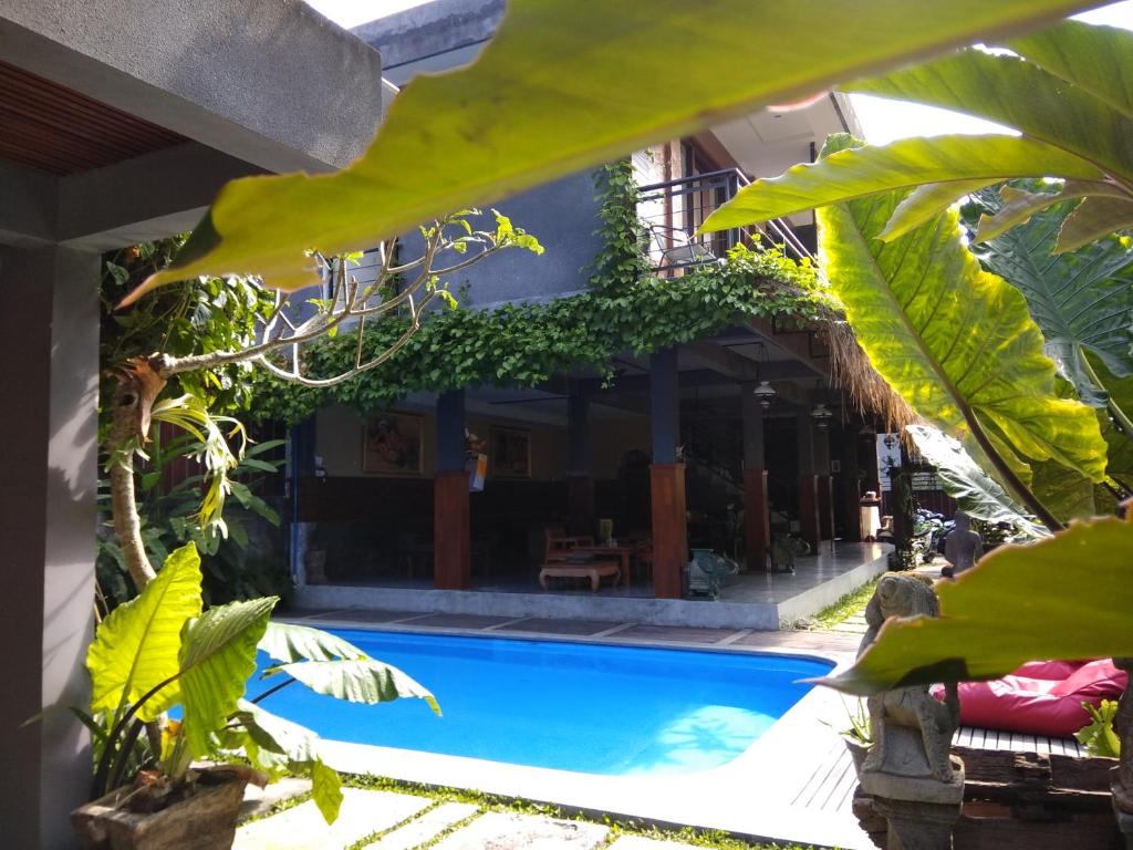 Bazén v ubytování Kencana Ubud by Mahaputra nebo v jeho okolí