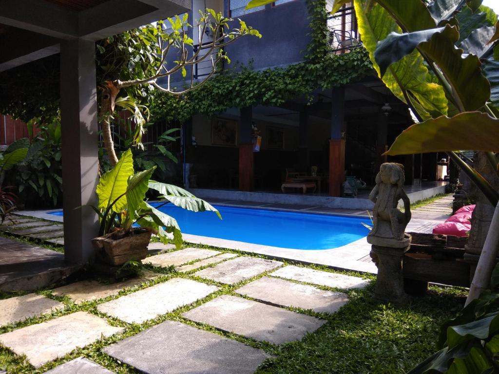 Bazén v ubytování Kencana Ubud by Mahaputra nebo v jeho okolí