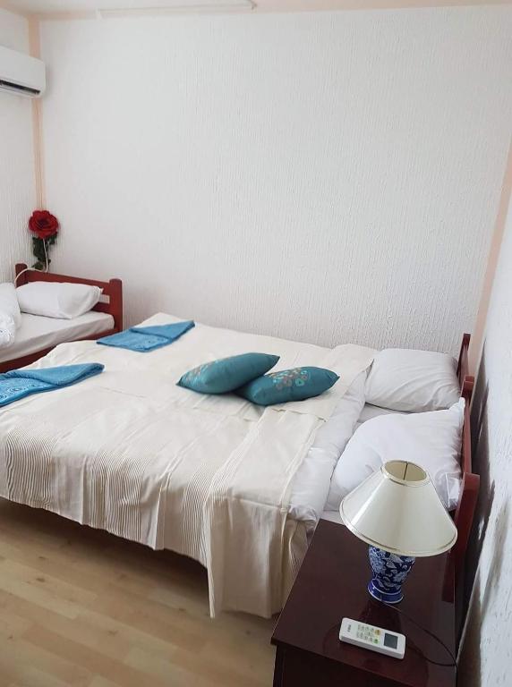 Postel nebo postele na pokoji v ubytování Golden Danube