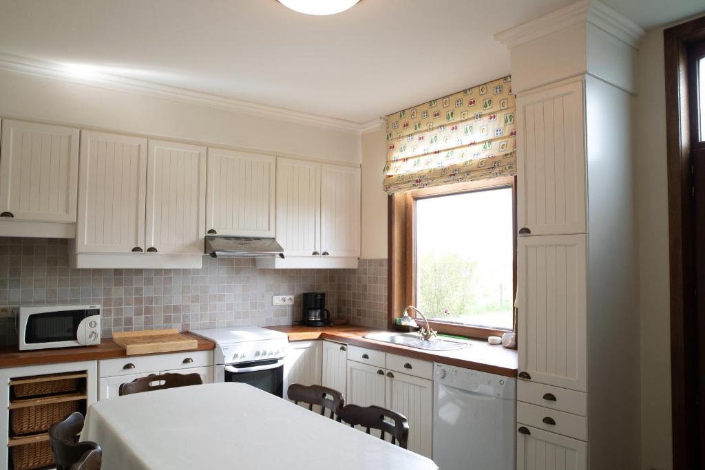 Kuchyň nebo kuchyňský kout v ubytování Averulle vakantiewoning