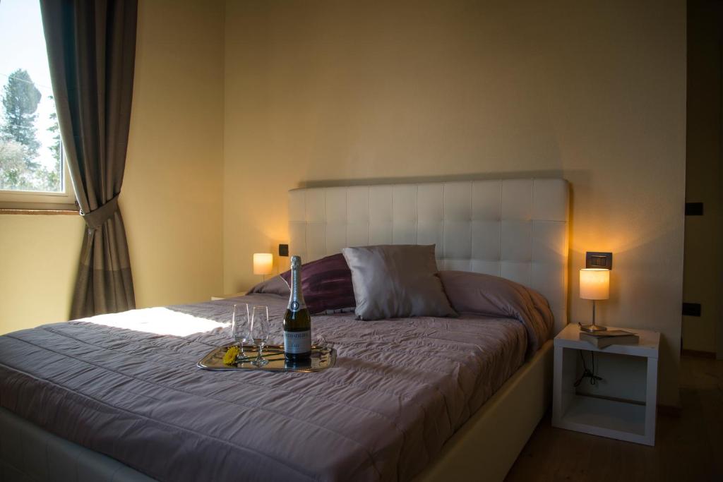 A bed or beds in a room at Villa la torre