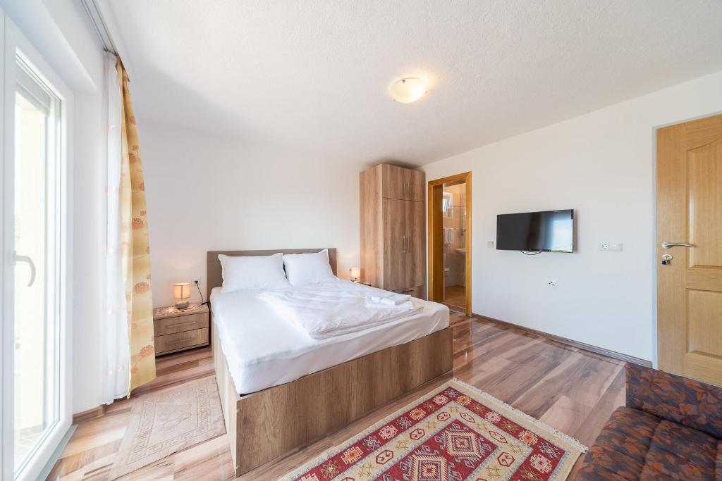 Posteľ alebo postele v izbe v ubytovaní Apartmenthaus Hana