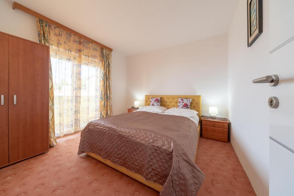 Posteľ alebo postele v izbe v ubytovaní Apartmenthaus Hana