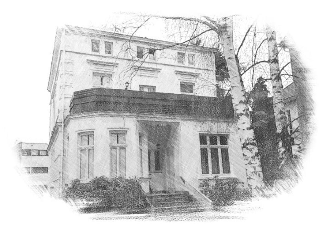 a black and white photo of an old house at A&S Ferienwohnungen Koblenzer Strasse in Bonn