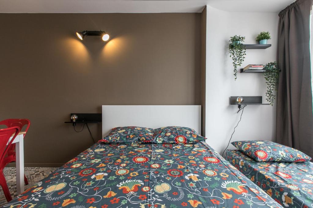 Postel nebo postele na pokoji v ubytování Studio Air d'été