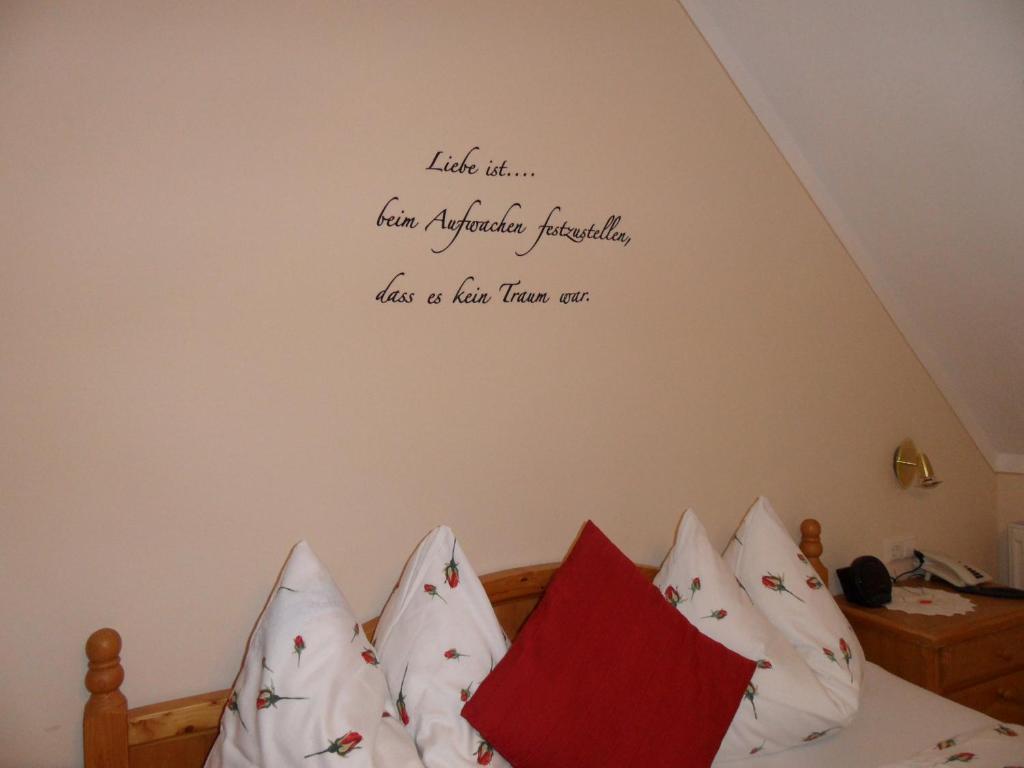 Postel nebo postele na pokoji v ubytování Landhaus Dampf